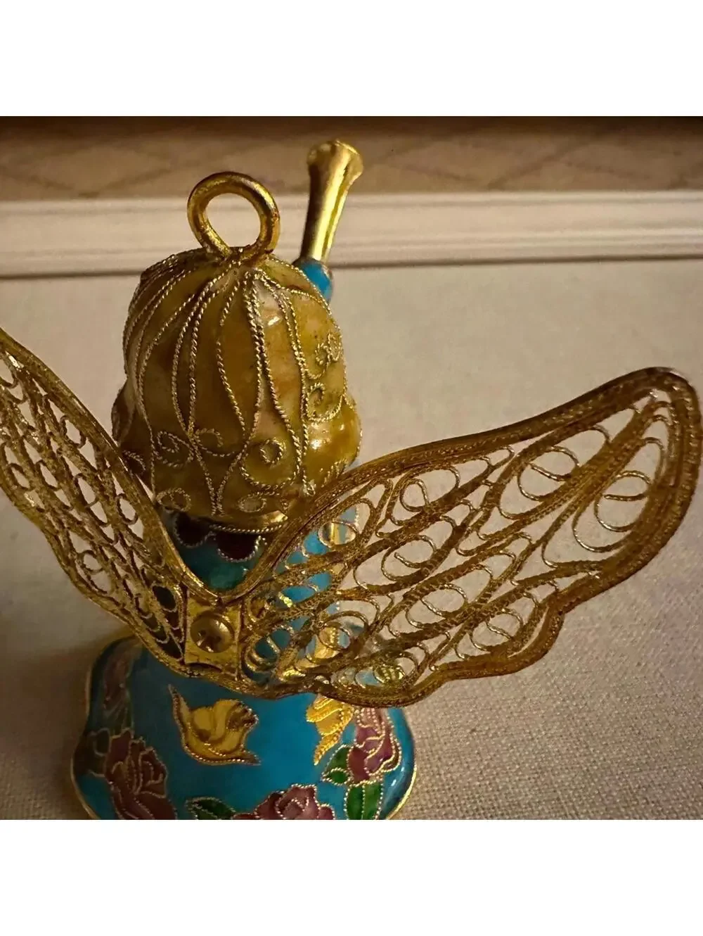 Vintage hand painted and glazed ceramic angel with trumpet 3d details